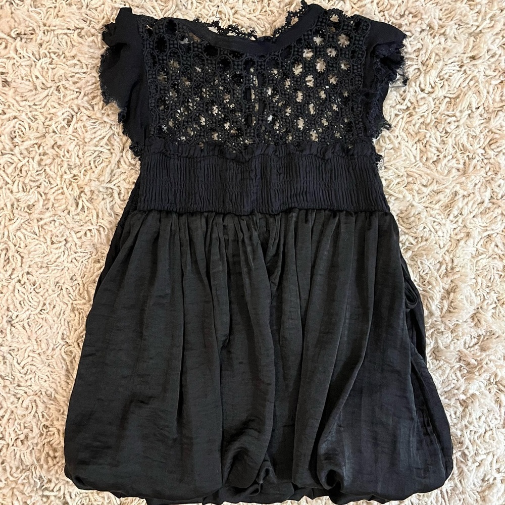 Free People top with cutout detailed pattern on the top